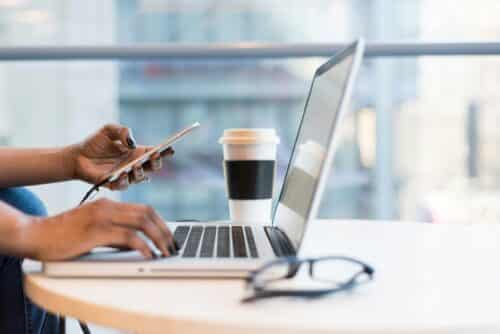 Free laptop on table top stock photo