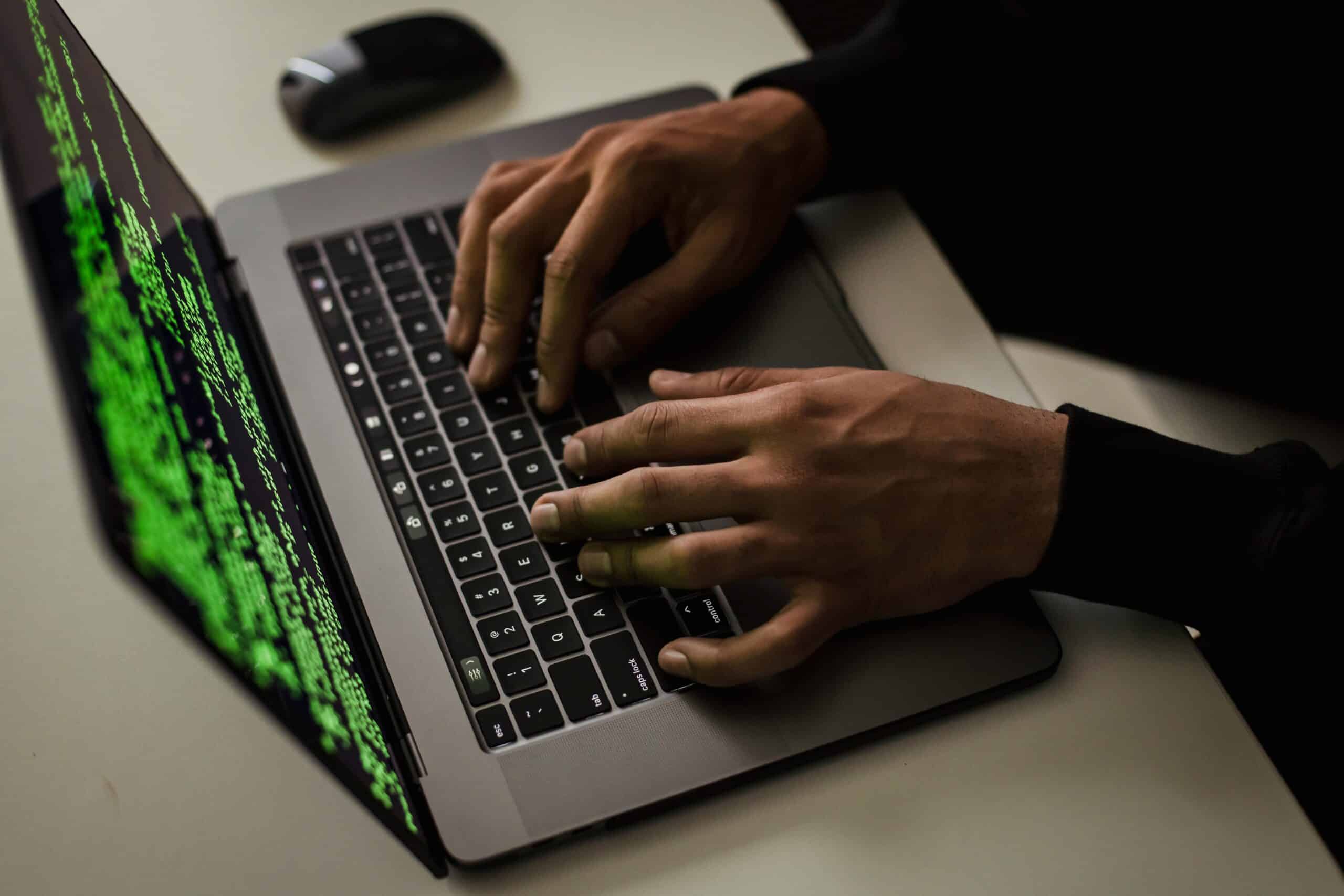 Blog 1 crop-cyber-spy-hacking-system-while-typing-on-laptop